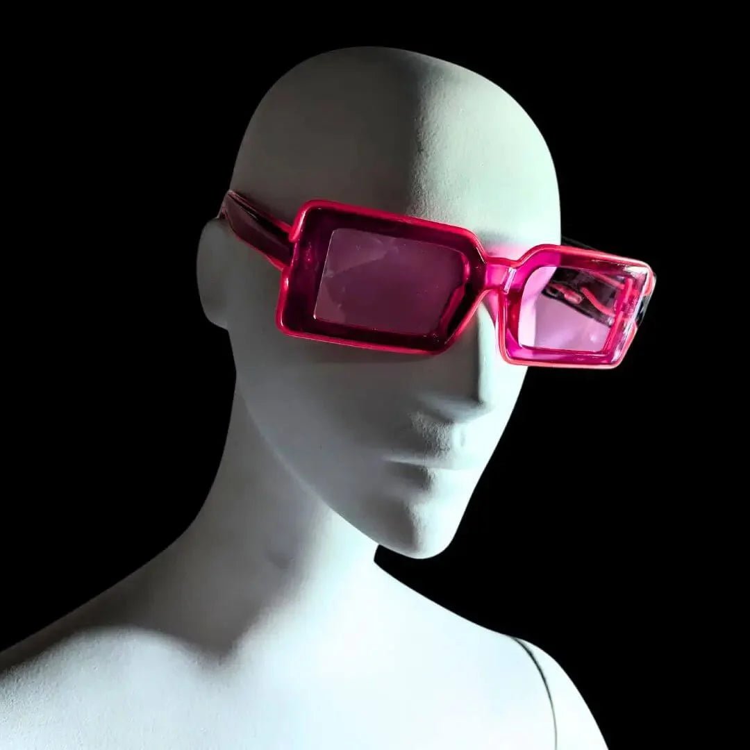 Clear Pink light-up rectangular sunglasses on mannequin - Vibrant LED party glasses for girls' night out, retro fashion events, glow parties, and costume accessories