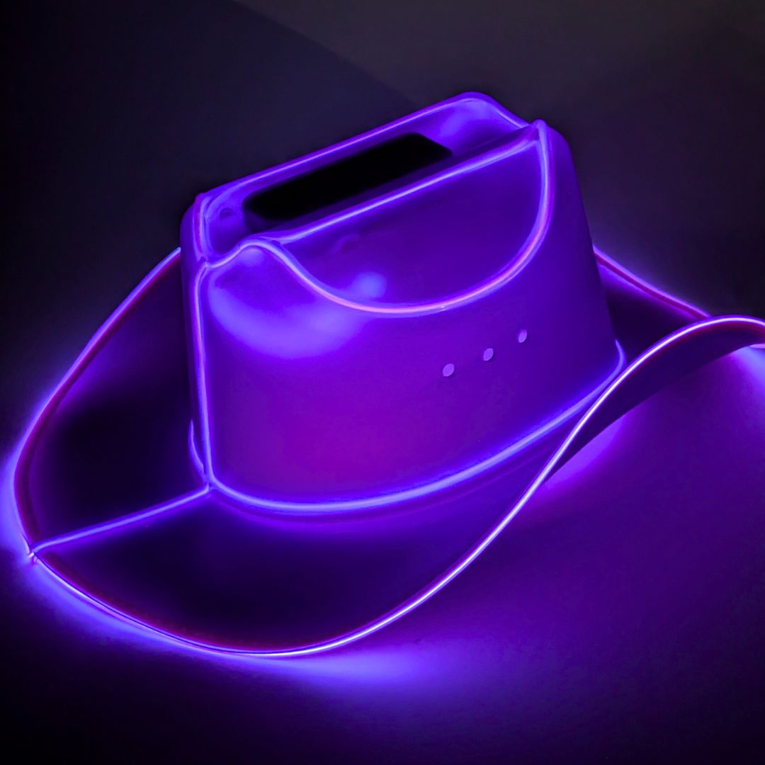 Purple LED space cowgirl hat glowing vibrant for Pride parade celebrations LGBTQ festivals and western costume party outfits