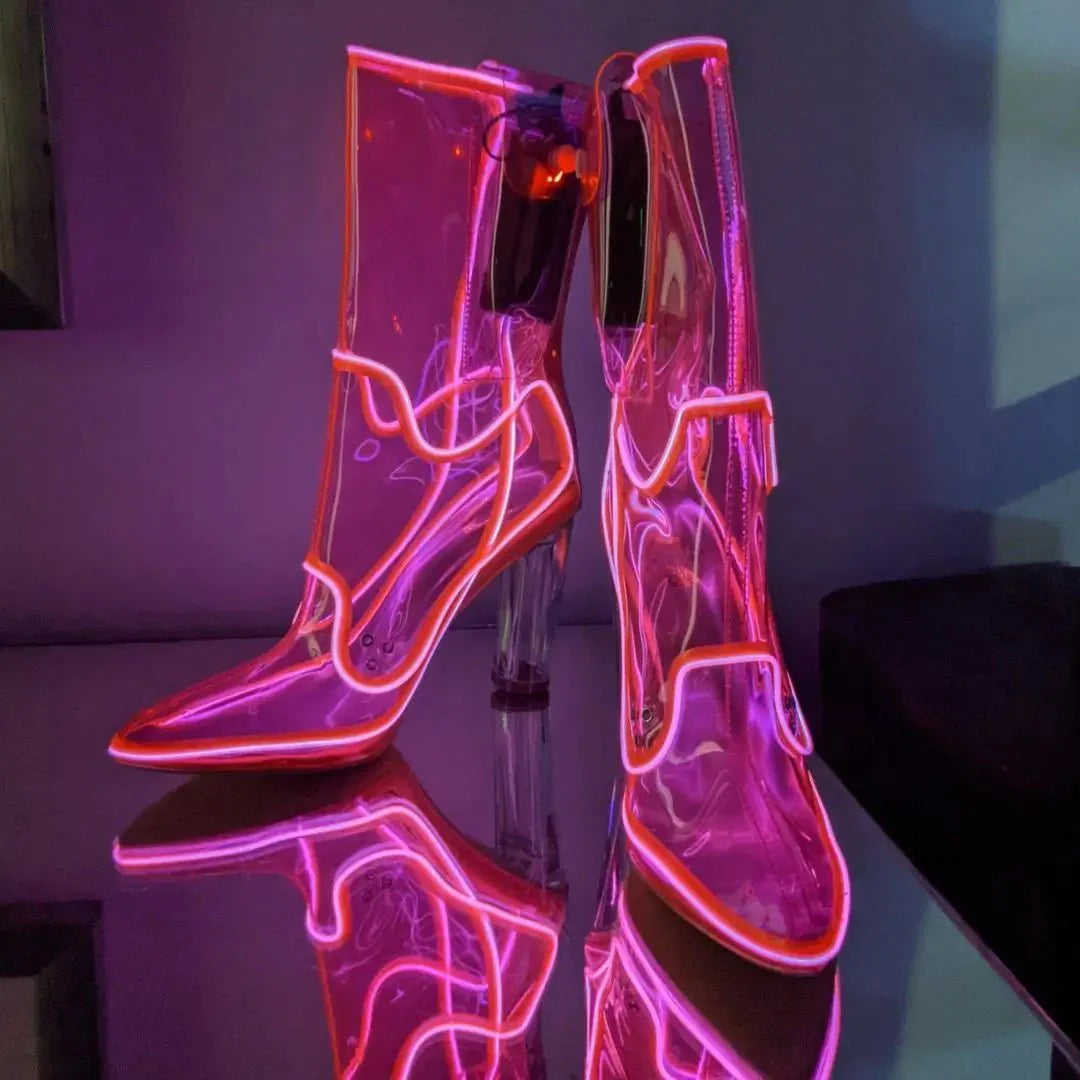 Pink LED light-up transparent heels with neon illuminated clear boots perfect for nightclub outfits music festivals and bachelorette party statement footwear