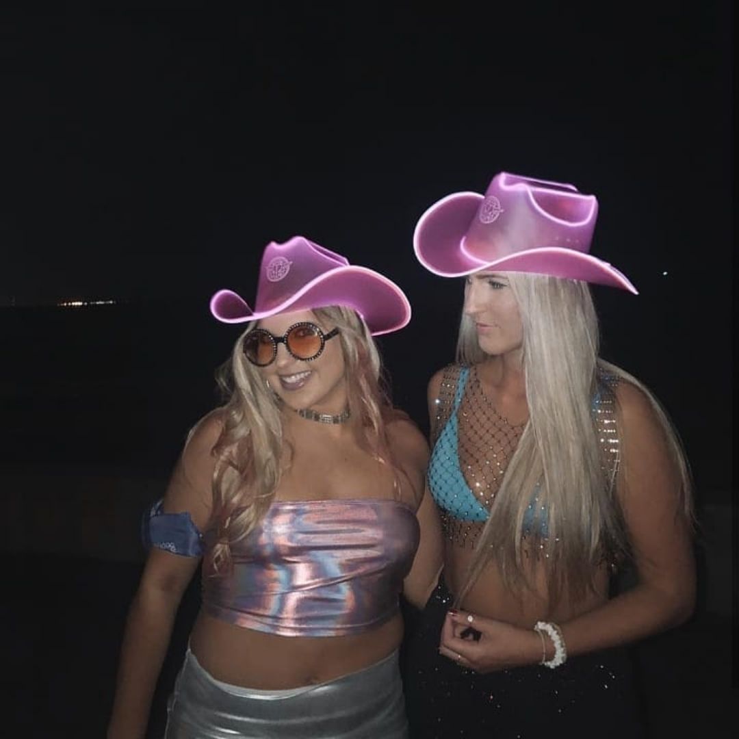 pink festival hat LED glowing perfect for nightclub fashion party photography social media content influencer lifestyle halloween shoots
