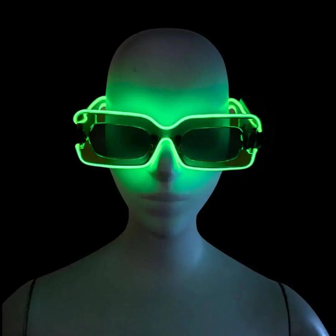 Green LED party sunglasses on mannequin against dark background - Y2K illuminated eyewear for Powerpuff Girl costumes, space cowgirl Halloween outfits, EDM festivals, and nightclub events