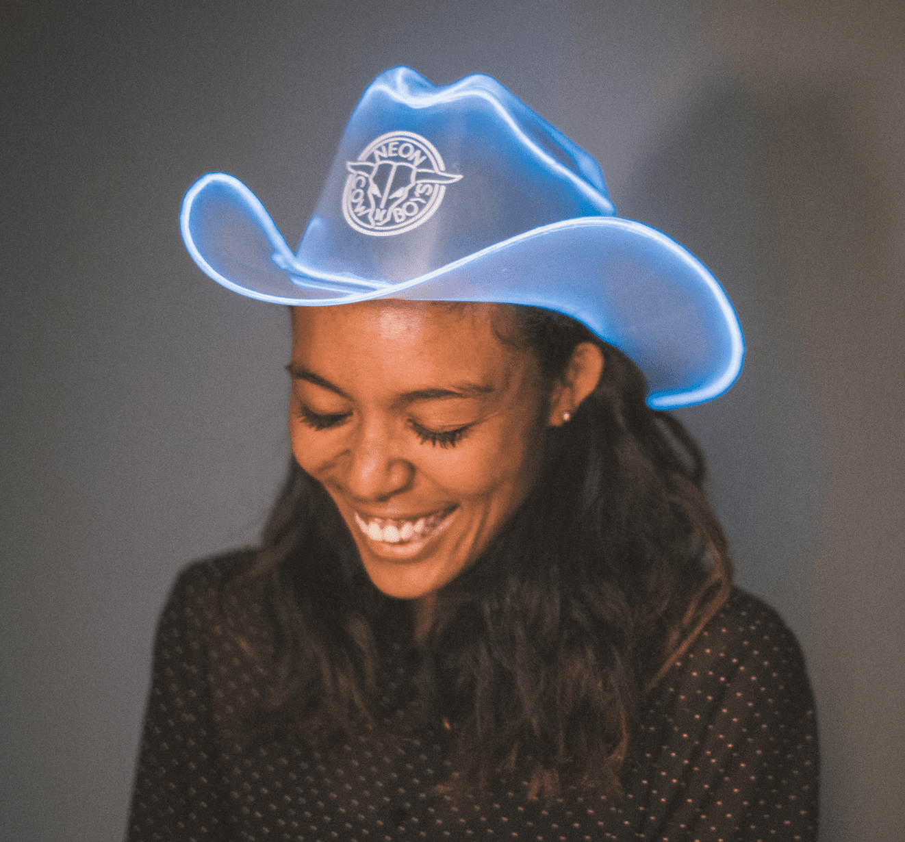 Neon Cowboys founder Asia Hall wearing her patented LED cowboy hat