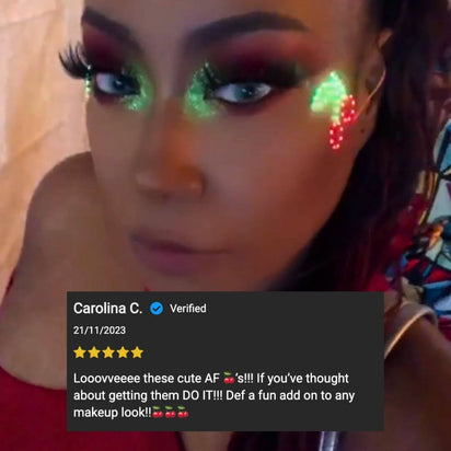 Customer review woman with cherry LED face stickers and colorful makeup - Glowing cherry facial accessories for rave outfits, editorial beauty shoots, Instagram content, and club appearances