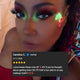 Customer review woman with cherry LED face stickers and colorful makeup - Glowing cherry facial accessories for rave outfits, editorial beauty shoots, Instagram content, and club appearances
