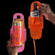 Hand holding orange and pink drink holsters with phone storage pocket for music festivals and outdoor events