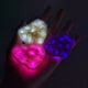 Collection of LED heart fuzzy hair clips in multiple colors - Assorted illuminated kawaii hair accessories in pink, purple, and white for concerts, parties, and fashion statements