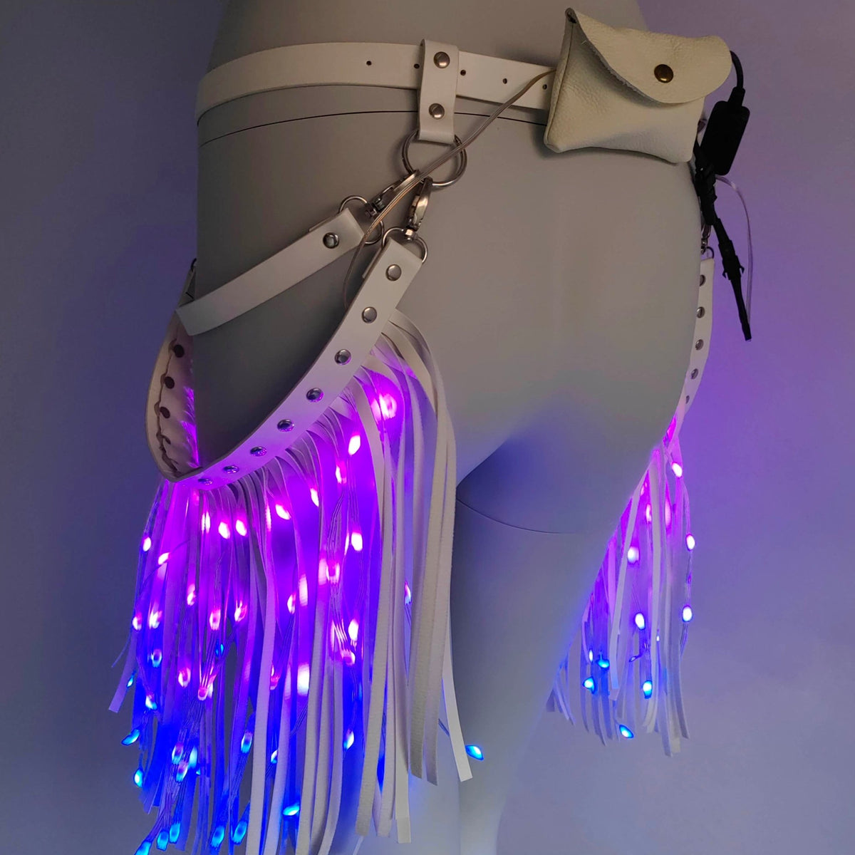 Purple LED Fringe Garter Belt on woman - Vibrant glowing thigh accessory for Coachella, costume parties and holiday celebrations