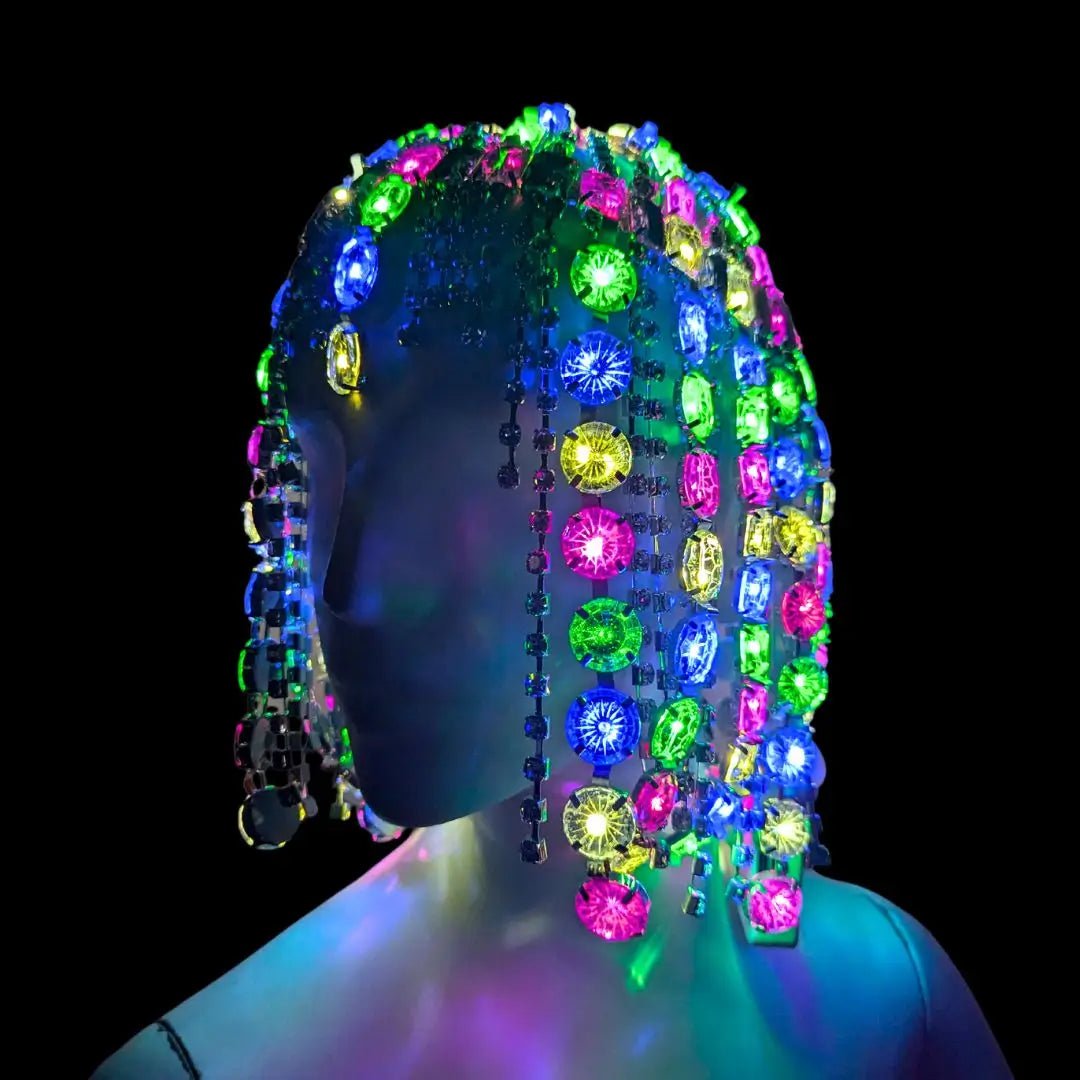 Woman wearing multicolor LED Rhinestone Gem Head Piece - Crystal-encrusted illuminated headwear with rainbow colors for Cleopatra-inspired looks