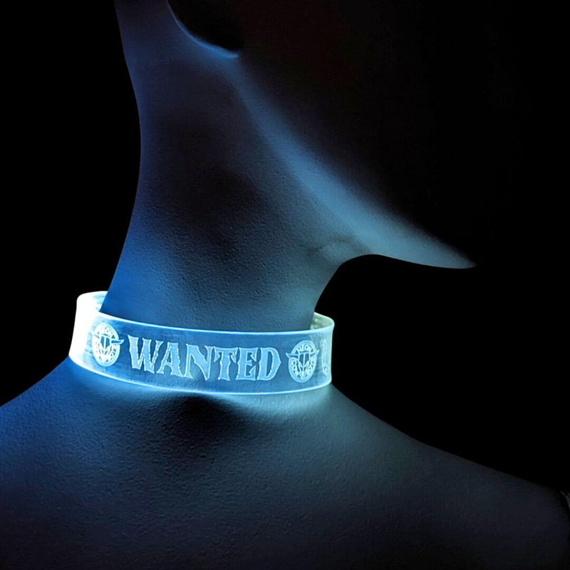 Neck wearing a cyan glowing Neon Cowboys LED WANTED choker necklace, transparent band lighting bright blue in the dark, a light up led necklace and rave jewelry that stands out in dark club lighting at a nighttime music festival, rave party, EDM concert and Halloween costume, Neon Cowboys