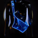 Blue illuminated fanny pack against dark background demonstrating vibrant glow effect for nighttime events and outdoor concerts
