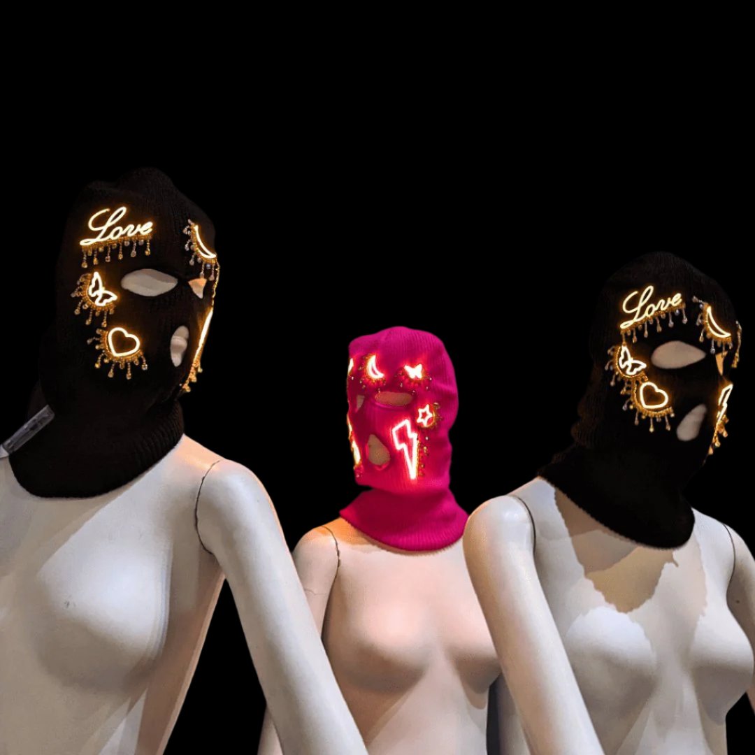 Display of black, pink and gold LED balaclavas - Collection of light-up face masks for costume retailers, party planners, event promoters, and electronic dance communities