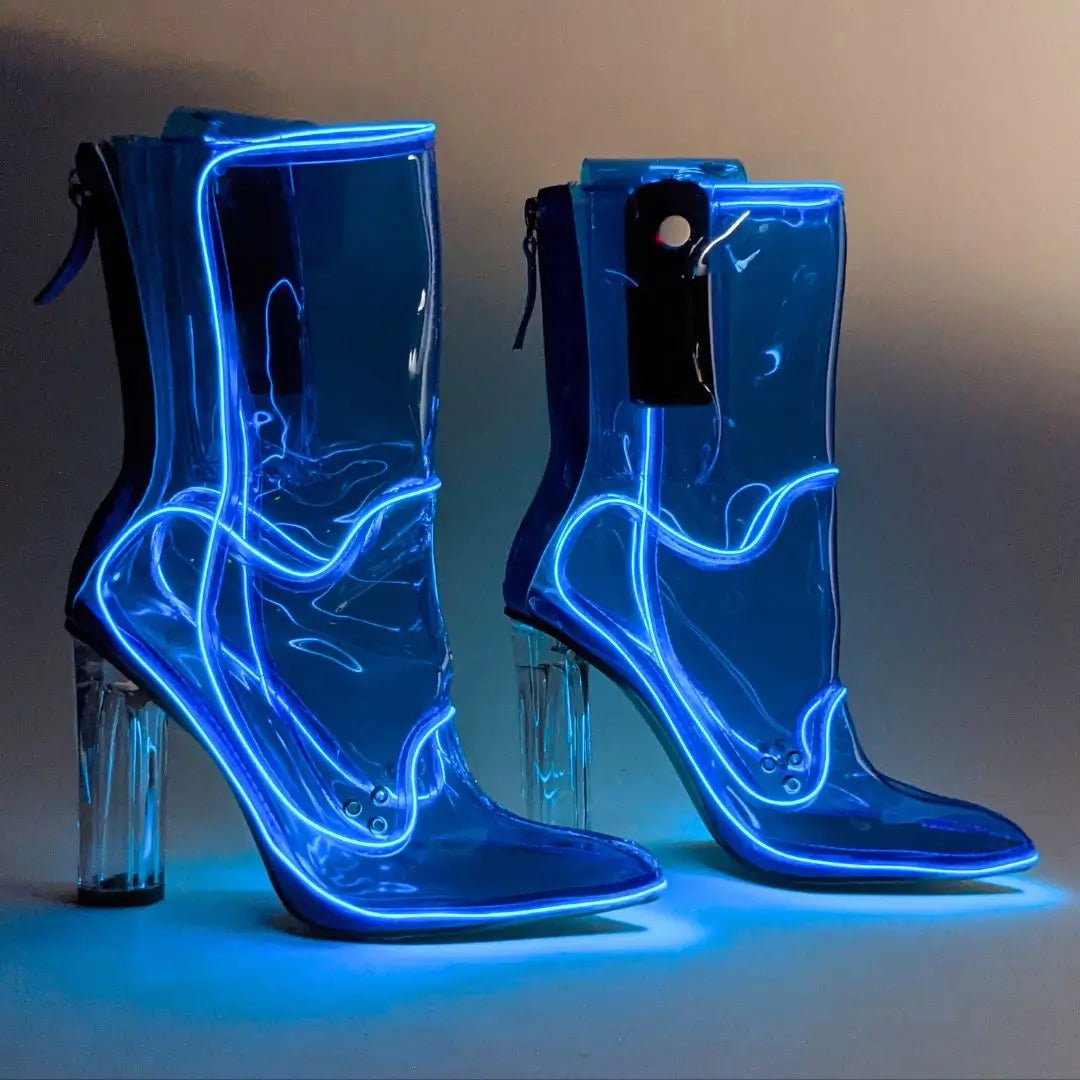 Blue LED transparent boots glowing brightly against dark background perfect for club nights EDM festivals and evening events