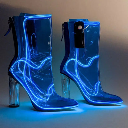 Blue LED transparent boots glowing brightly against dark background perfect for club nights EDM festivals and evening events