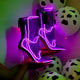 Multiple pairs of purple LED boots in different styles showcasing variety of illuminated footwear options for coordinated group outfits, Mardi gras parades, luxury birthday girl outfit