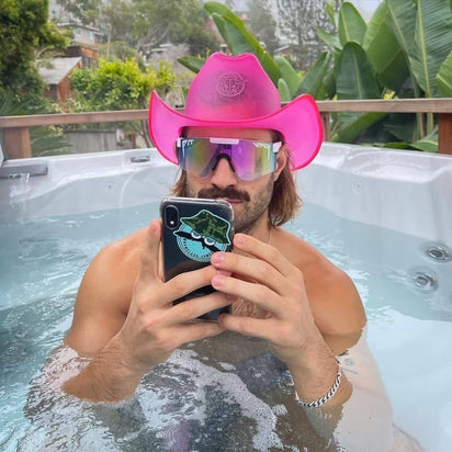 fierce space cowboy pink neon hat perfect for hot tub clubbing events sophisticated party themes adult celebration accessories lifestyle entertainment photography