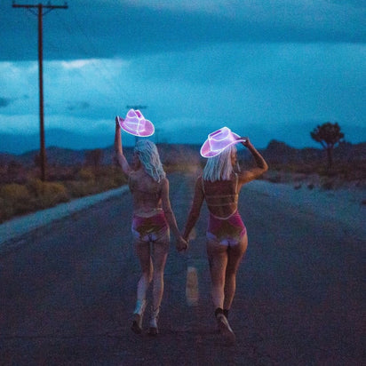 glam space cowgirl hat pink glowing perfect for wedding reception photo booth props bridal party accessories themed wedding photography