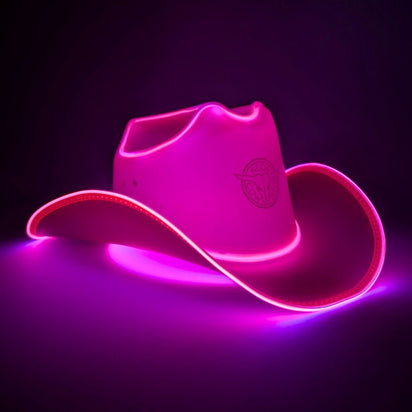 hot pink space cowgirl LED hat lifestyle product shot perfect for space cowgirl costume parties neon accessories sci-fi themed events cosmic Halloween outfits
