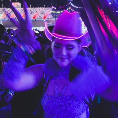 space cowgirl outfit hat pink LED perfect for date night fashion romantic evening accessories dinner party style couple photography