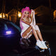 supermodel winnie harlow in fierce space cowgirl hat glowing LED pink perfect for coachella vacation photography summer festival fashion resort party accessories lifestyle content