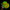 Hand holding Limited Edition Neon Cowboy Hat with acid green LED trim on yellow cowboy hat - Vibrant neon western headwear glowing in dark setting