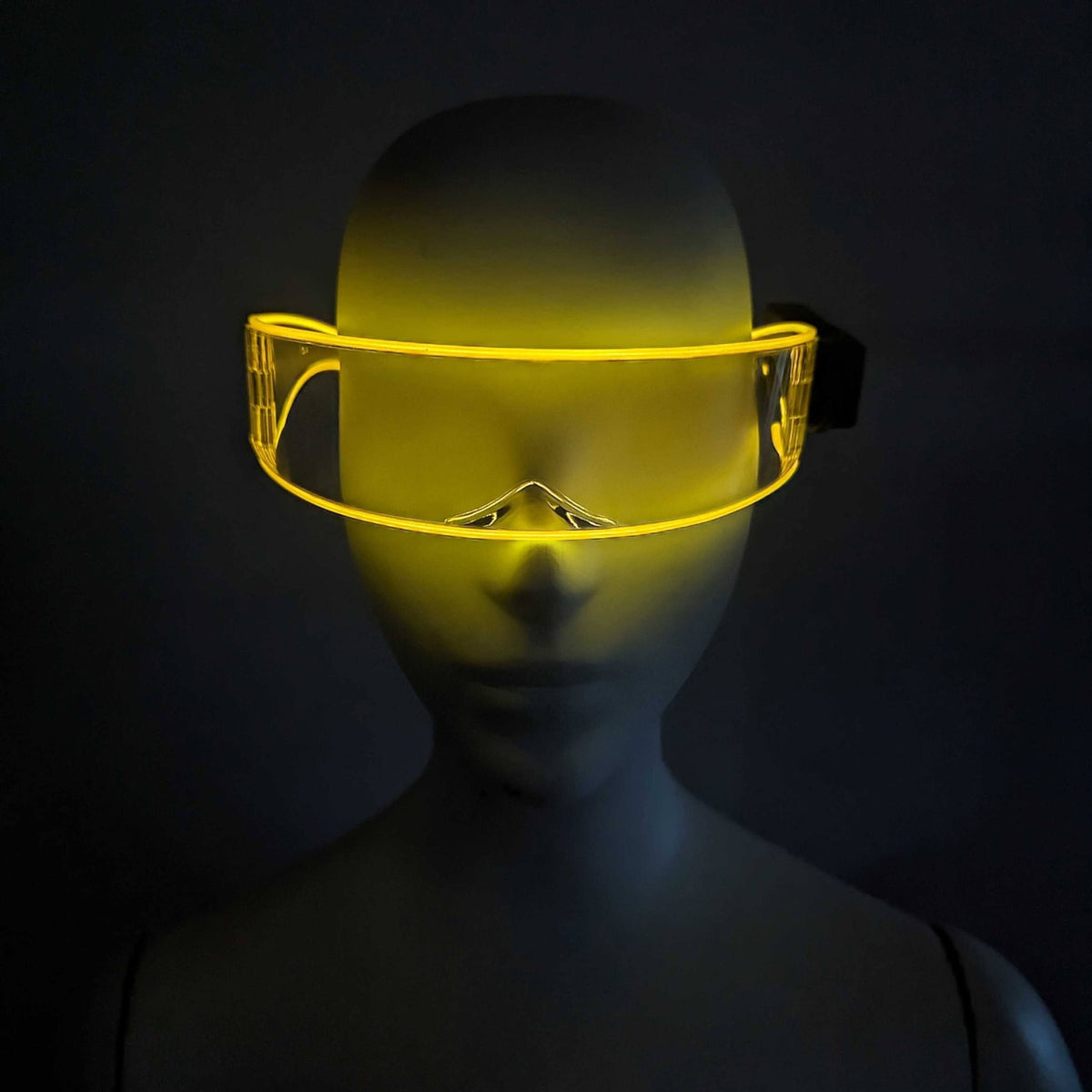 Yellow illuminated transparent cyber glasses in dark setting - Glowing futuristic eyewear for sci-fi parties, Daft Punk cosplay, nightclub events, and Blade Runner themed gatherings