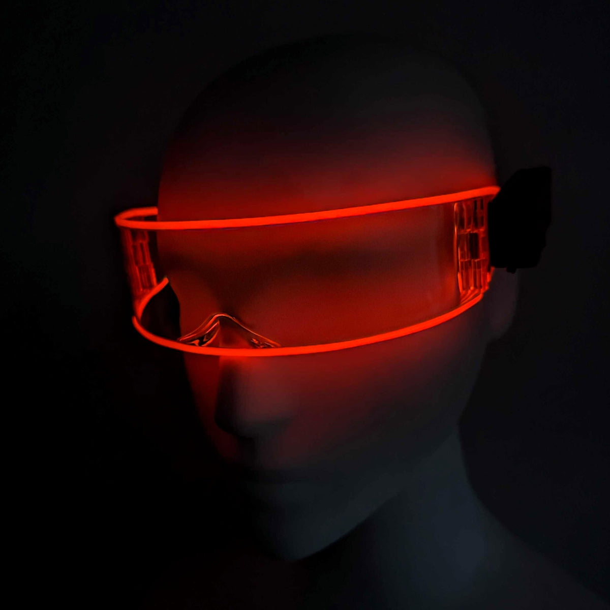 Red LED transparent cyber glasses on display - Vivid illuminated cyberpunk eyewear for robot costumes, hacker-themed parties, tech launches, and dystopian film premieres