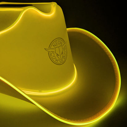 Yellow LED neon cowgirl hat glowing vibrant for country music festivals concert outfits and western costume party fashion