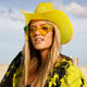 Yellow cowboy hat glowing bright with LED lights for masculine country bar parties western themes and music fashion