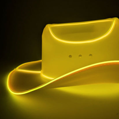 Yellow cowboy hat with LED lights glowing ideal for honky tonk bar parties western costume celebrations and country fashion
