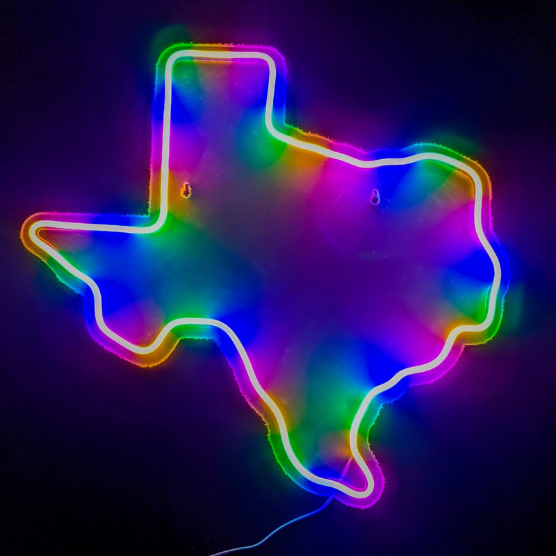 Neon Cowboys Texas LED sign glowing rainbow with the state outline lit up on a dark wall, light up western neon sign wall decor for bars, home decor, dorm rooms and country party backdrops, Neon Cowboys