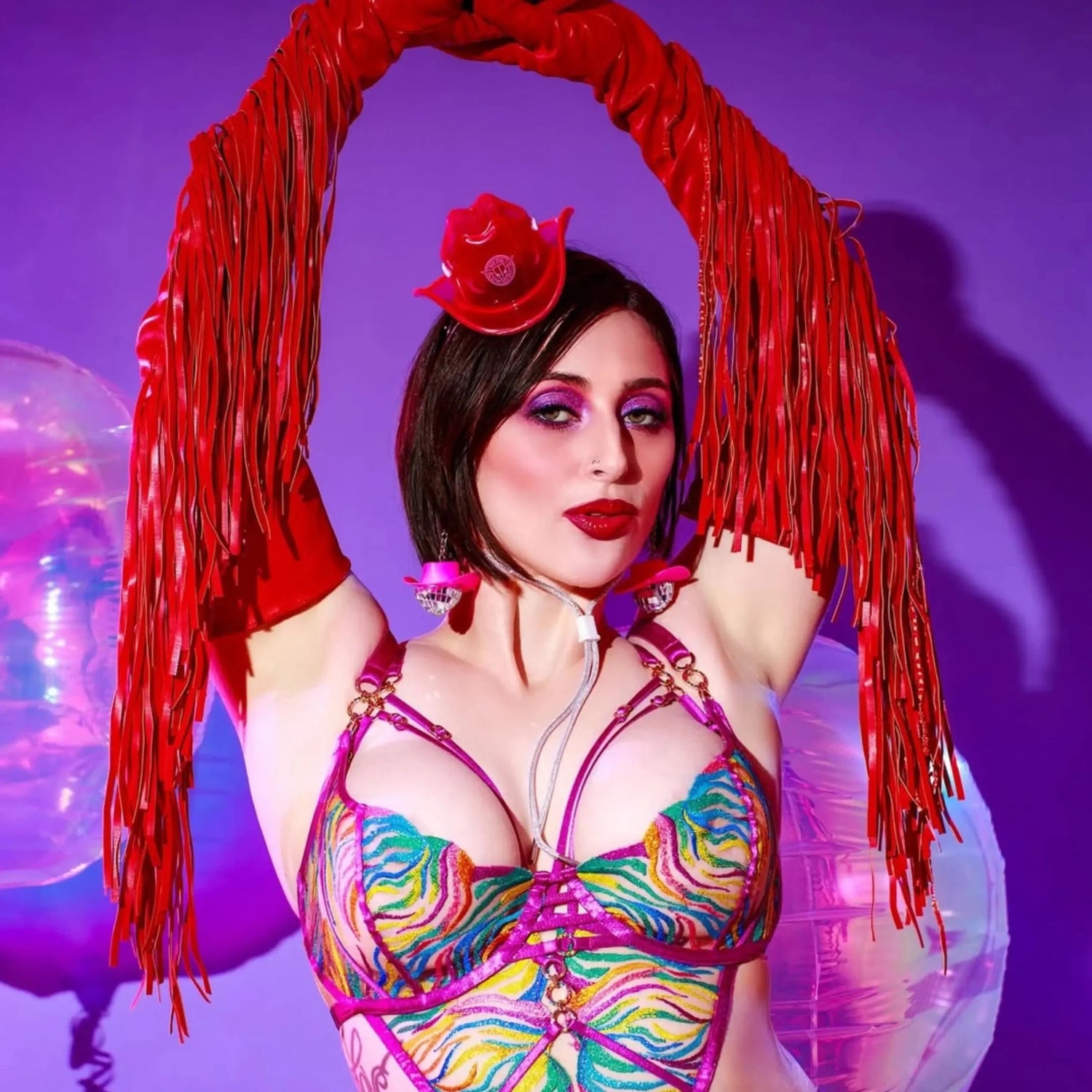 Themed party attendee wearing mini neon cowboys hat for western costume contests dress-up events and country karaoke nights with illuminated accessories