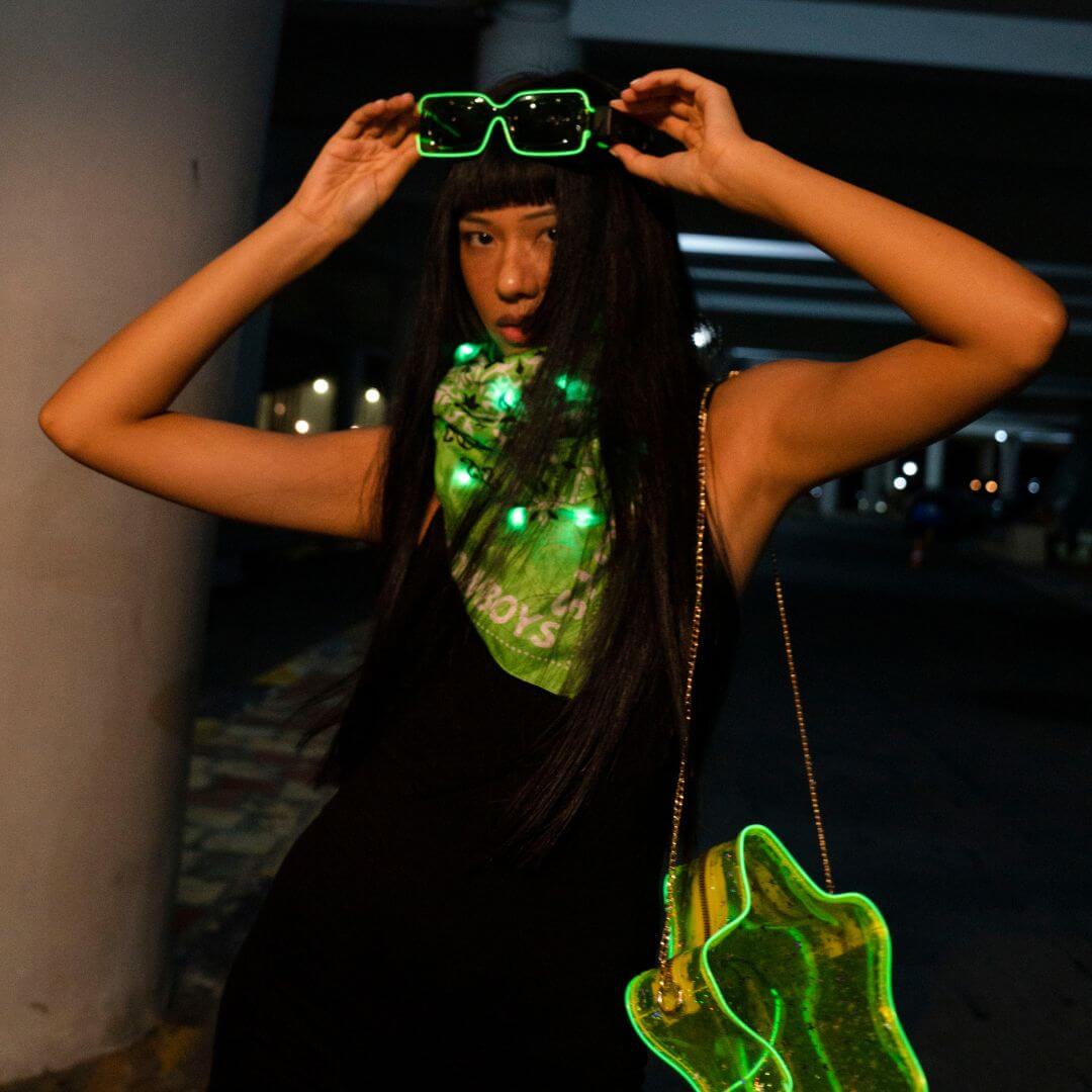 Green LED party sunglasses and glowing accessories for raves, music festivals, EDM concerts - trendy light up fashion for nightlife, electronic dance events, and holidays like st patricks day, mardi gras, and college tailgating