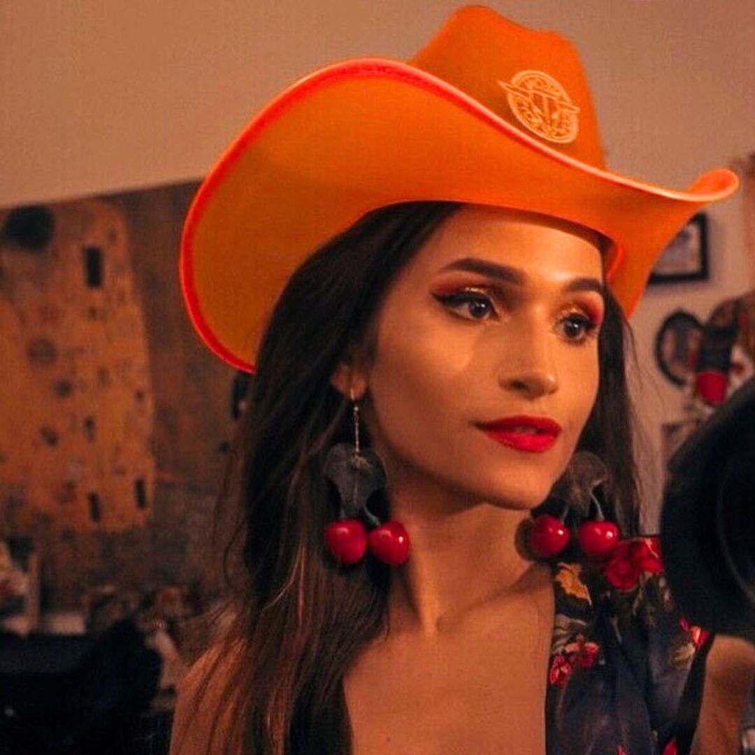 Orange LED neon cowgirl hat with lights perfect for Halloween party celebrations spooky costume events and western themed fashion