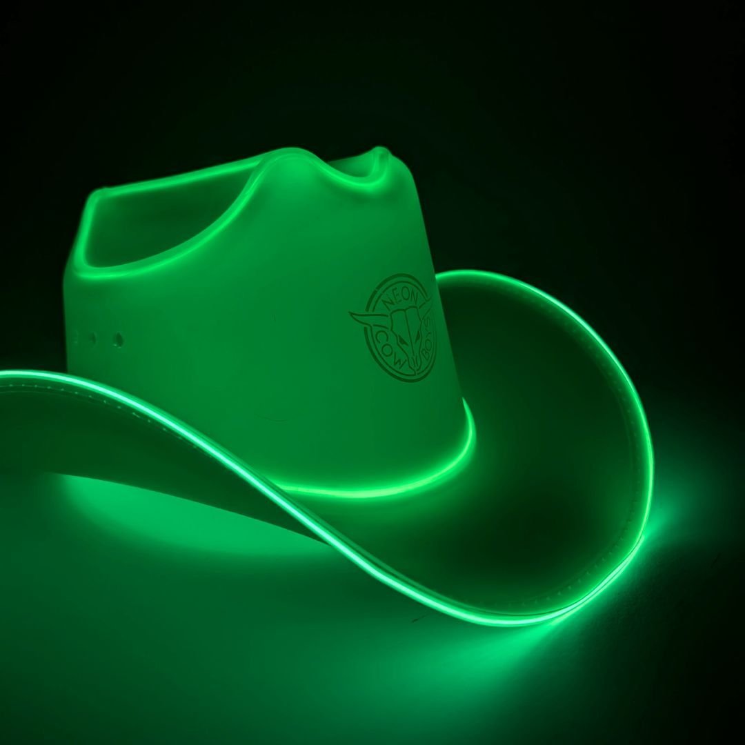 Green LED neon cowgirl hat glowing vibrant for St Patrick's Day party celebrations Irish festivals and western costume outfits