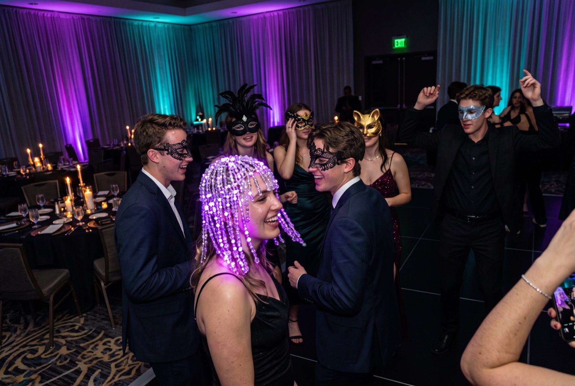Light up LED gem headpiece glowing purple at a masquerade formal, crystal strands over the face