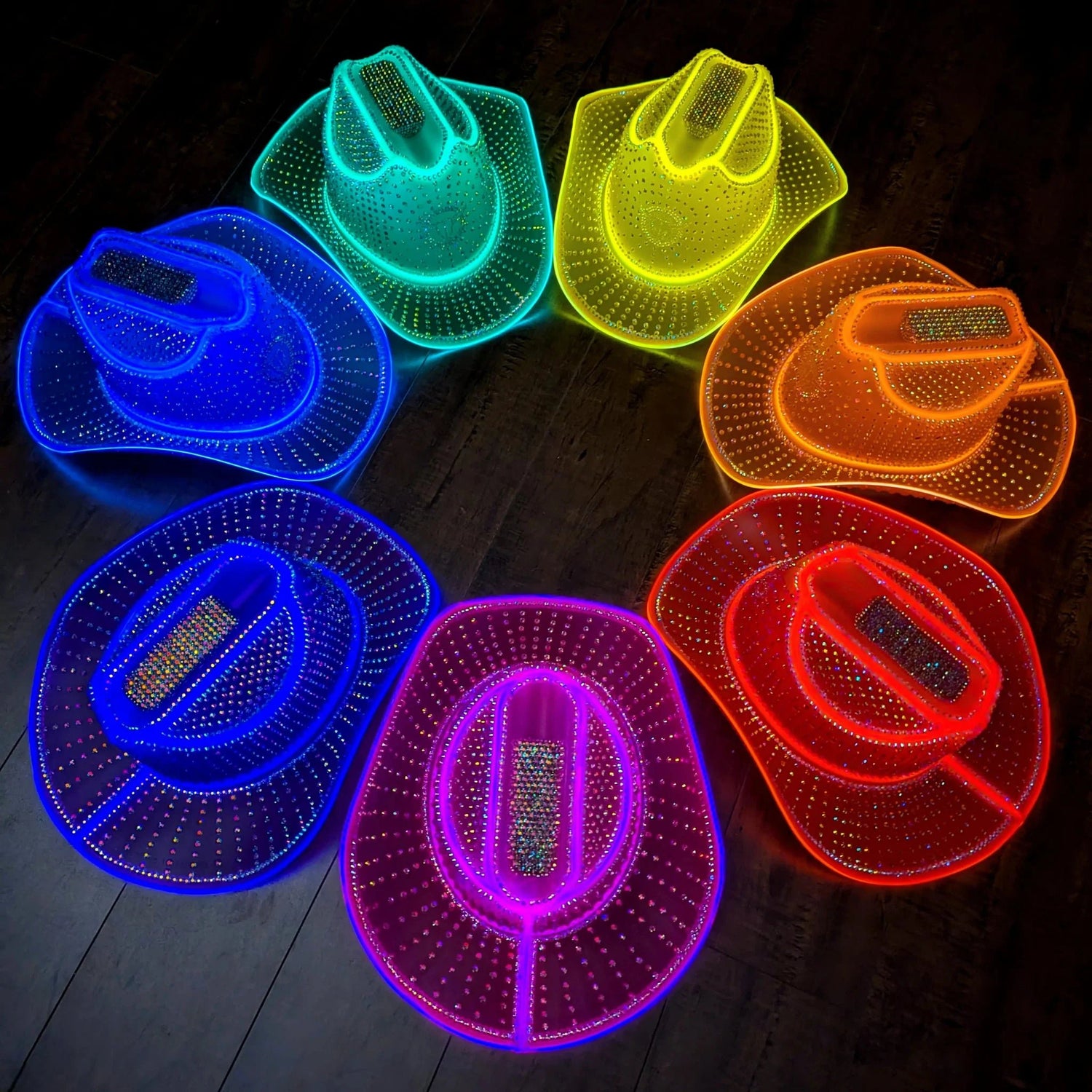 Collection of multi-colored rainbow crystal LED cowboy hats - Designer party accessories for music festivals, celebrity styling, Pride celebrations, and viral fashion trends