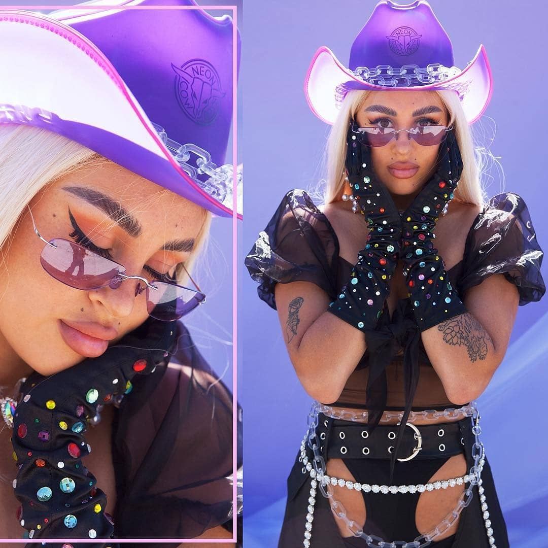 Purple space cowgirl hat with bright LED lights ideal for astrology themed parties cosmic celebrations and western costumes