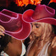 Pink LED cowgirl hats glowing bright for female friends matching party costumes festival outfits and celebration accessories