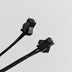 Close-up of Two Prong Splitter connector ends - Black cable adapter for linking light-up accessories with dual connection points