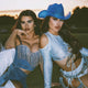 Blue cowgirl hat with bright LED lights ideal for luxury event planning high end parties and western costume celebrations