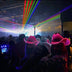 LED cowboy hats illuminating crowded nightclub event - Colorful light-up western headwear creating festive atmosphere for dance clubs, New Year's Eve parties, corporate celebrations, and cruise ship events