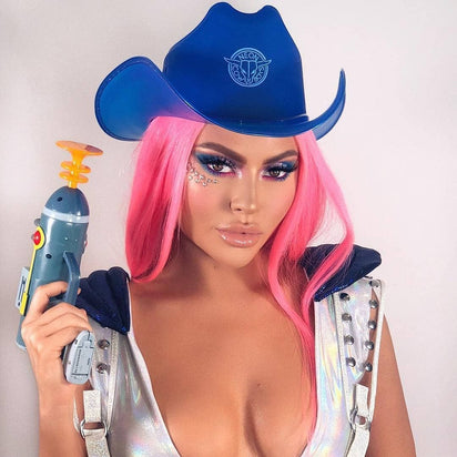 Blue LED cowgirl hat with lights glowing for group photo sessions bachelorette parties and western costume fashion celebrations