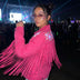 Animated Starlight Jacket with Fringe, woman at a night rave festival with laser lights in a pink LED star fringe jacket and sunglasses, an led costume and light up jacket stagewear for rave performers, EDM concerts, Coachella and EDC, Neon Cowboys