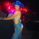 Blue cowboy hat with bright lights glowing perfect for nightclub party celebrations dance events and western costume fashion