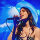Blue cowgirl hat glowing bright with LED lights ideal for karaoke night entertainment venues and western costume parties