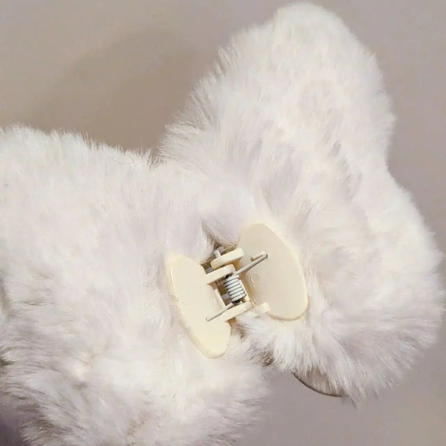 White fuzzy butterfly hair clip showing soft texture - Light-colored plush hair accessory option for bridal styles, winter wonderland themes, angelic costumes, and everyday kawaii fashion