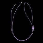Purple elastic chin strap with adjustable sliding feature for custom fit with light up cowboy hats at music festivals