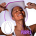 Person demonstrating purple light up cowboy hat with elastic chin strap securing hat while dancing at music festival
