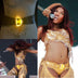 Doechii at Coachella wearing yellow illuminated belt buckle with custom letter creating personalized statement piece for music festival performances