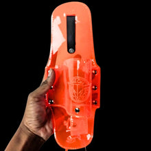 Orange drink holster with 12oz bottle showing belt clip attachment for outdoor music festivals and sporting events